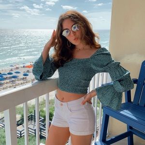 Cropped long sleeve polka dot top